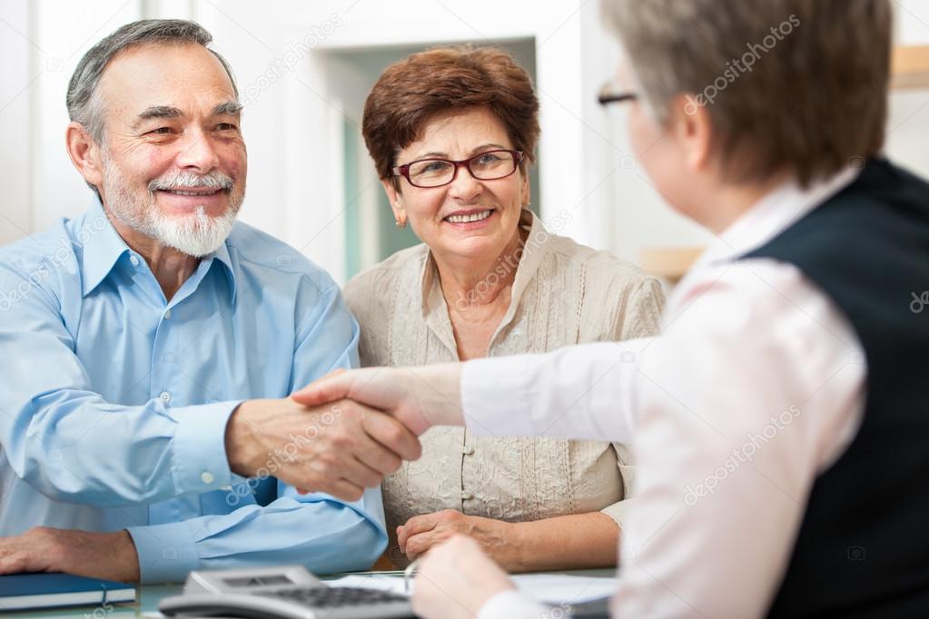 Professional advisor reviewing documents with client